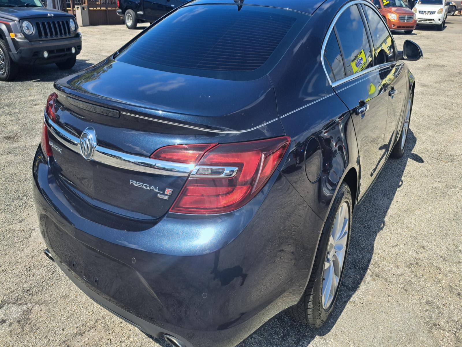 2014 Blue Buick Regal Premium 1 AWD (2G4GP5EX5E9) with an 2.0L L4 DOHC 16V TURBO engine, 6-Speed Automatic transmission, located at 1181 Aurora Rd, Melbourne, FL, 32935, (321) 241-1100, 28.132914, -80.639175 - Photo #2